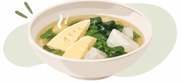 一碗有竹筍、蘿蔔和青菜的湯